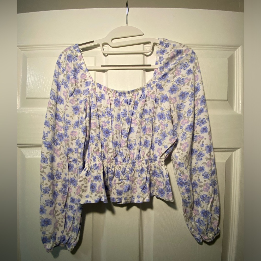 Blue ruffled long sleeve blouse